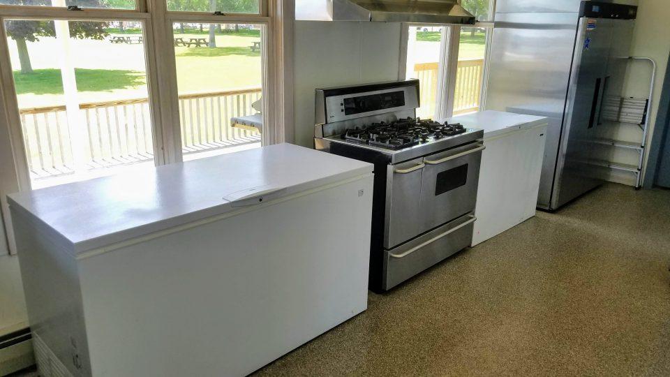 M&M Clubhouse kitchen range and two chest freezers